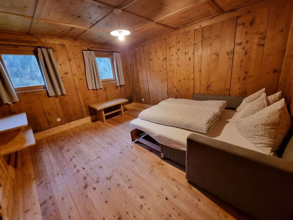 Bergchalet Englhof - Wohnzimmer, Schlafcouch